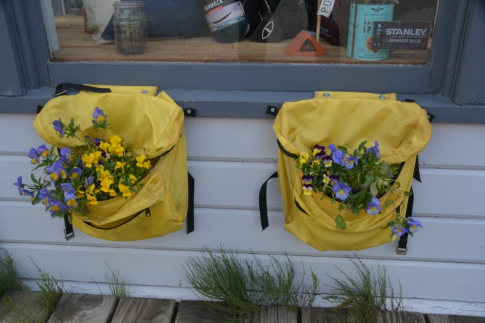 book bags used as flower pots